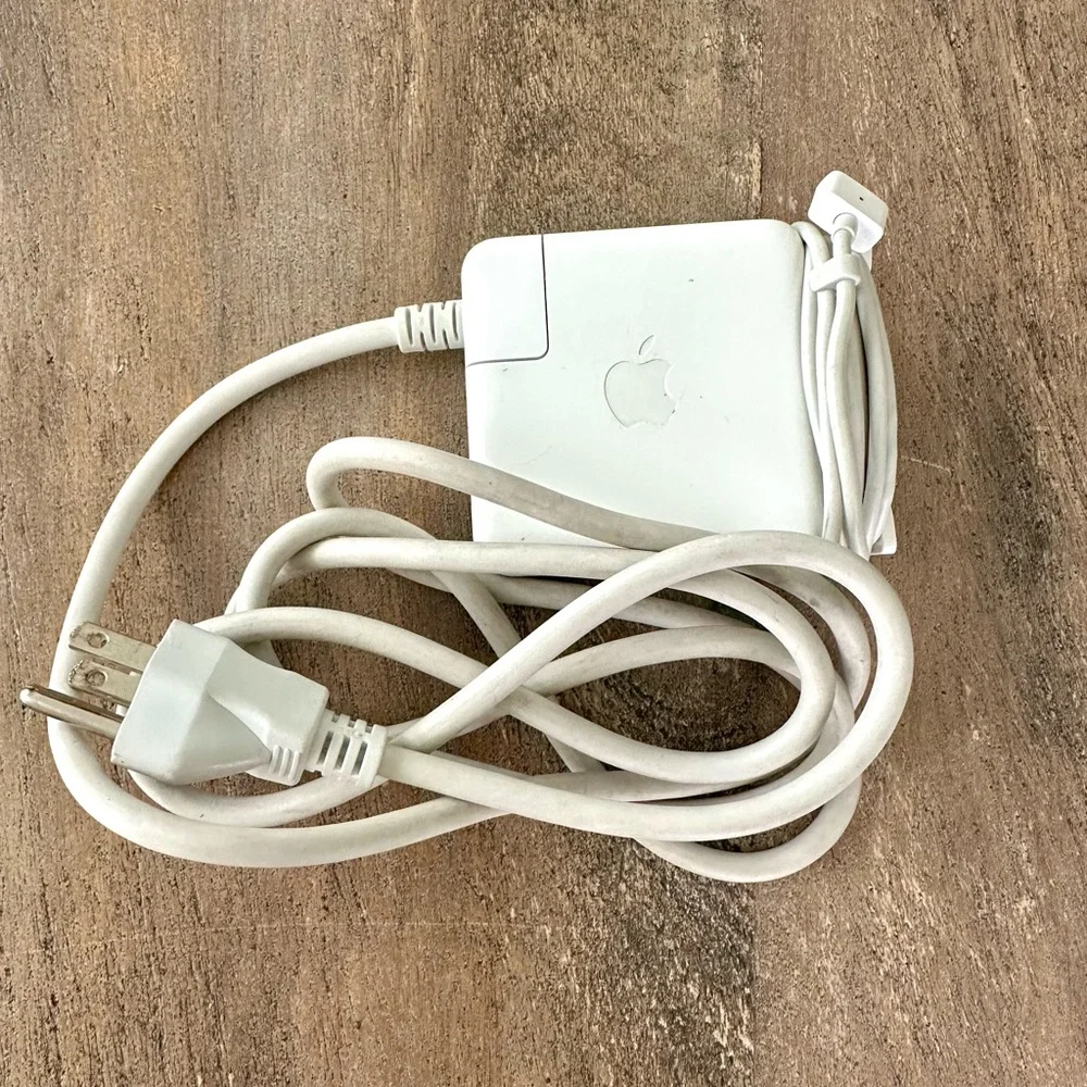 Apple MacBook White Charging Adapter.
